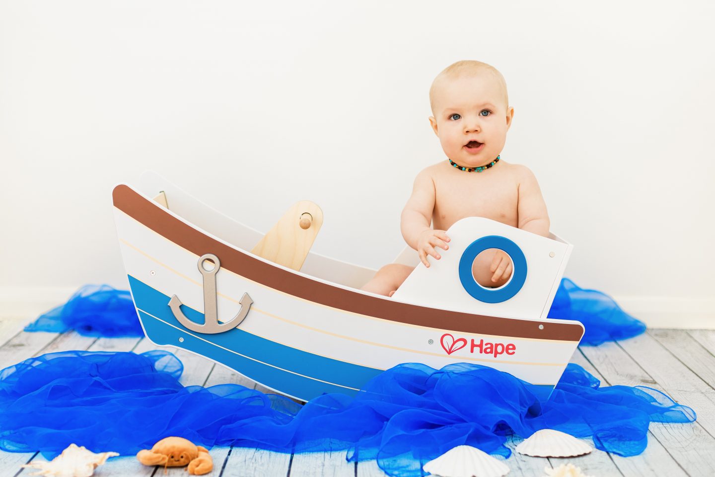 Baby's 1st birthday photoshoot seaside boat